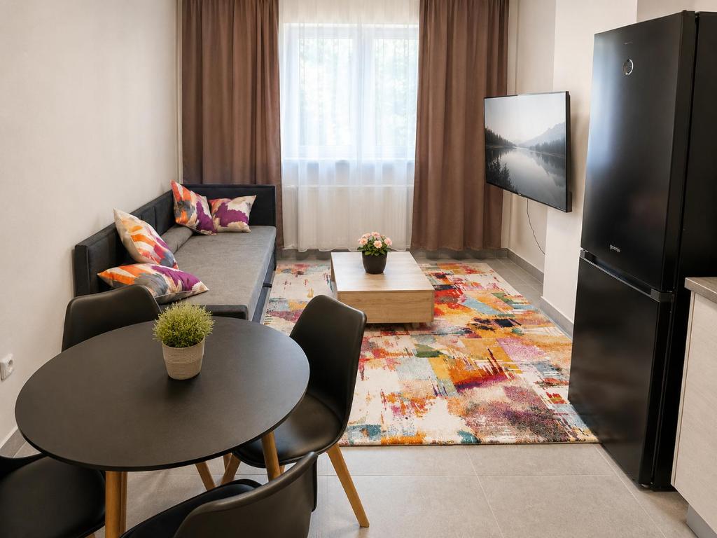 Obývací pokoj apartmánu 207 Olympland