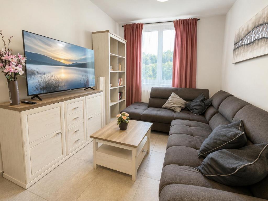 Obývací pokoj rodinného apartmánu 201 Olympland